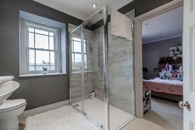 The brochure says: "A practical Jack and Jill shower room leads from the landing with access too from one of the double bedrooms."