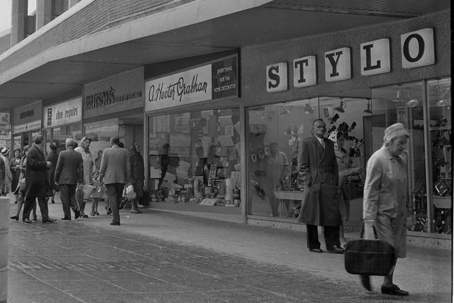 The town centre in the early 70s. Fancy a new pair of shoes from Stylo?