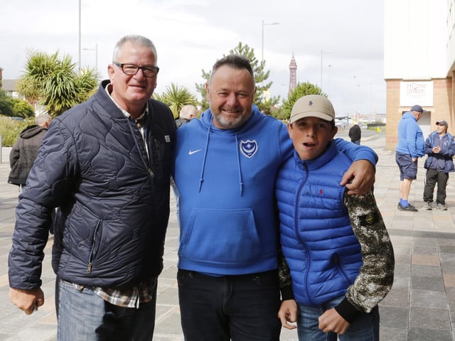 All smiles outside Blackpool's Bloomfield Road.