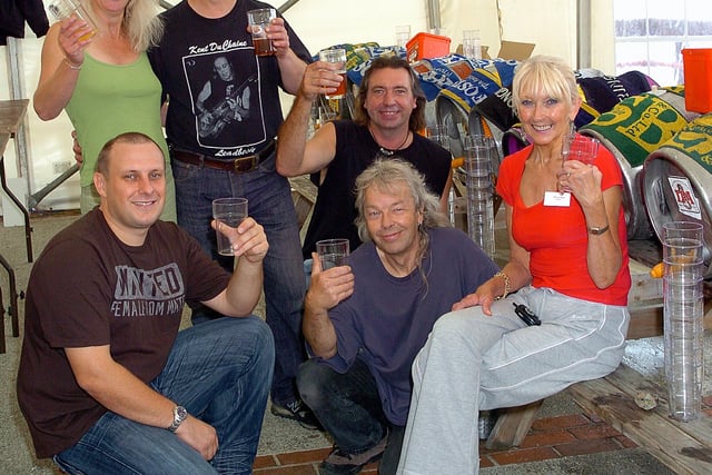 2006. Inn on the Beach, Ferry Road, Hayling Island, Music and Beer Festival, where landlords (standing left), Diana Cole (47) and Carl Carley (44) are pictured with Paul Knott (32), Ronnie Sims (49), Guy Heape (55) and Astrid Haigh-Smith (*no age given*) preparing for the event. Picture: Michael Scaddan 063710-0018
