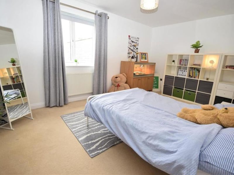 Another good-sized bedroom which, as you can see, is loved by the teddy bears! There is a radiator and also a uPVC window to the back.