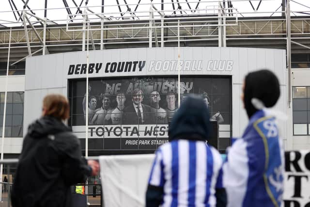 Sheffield Wednesday supporters watch on ahead of their do-or-die cash with Derby County back in May.