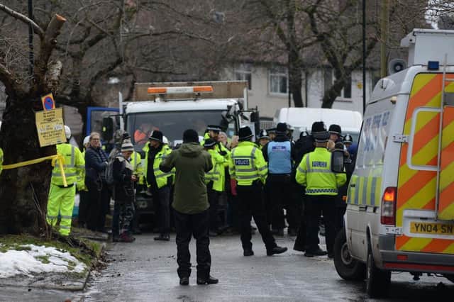 Tree protestors and police on Abbeydale Park Rise as Amey attempt to cut down more trees. Picture Scott Merrylees