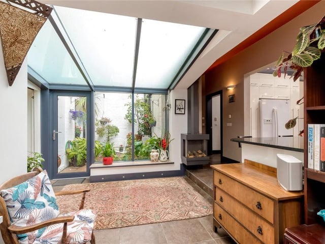 Snug / home office with access to courtyard.