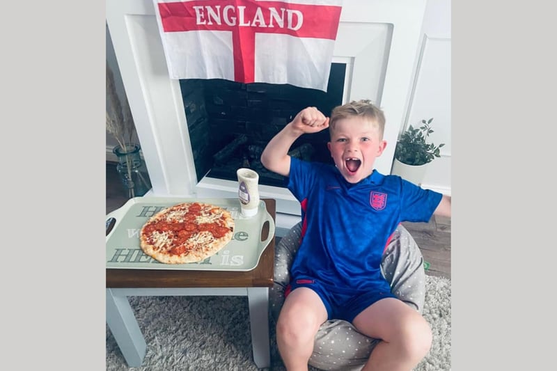 Max Bradley age 7. We love his enthusiasm! (and his pizza).