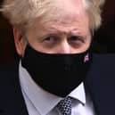 Prime Minister Boris Johnson leaves 10 Downing Street For PMQs on January 12