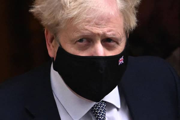 Prime Minister Boris Johnson leaves 10 Downing Street For PMQs on January 12
