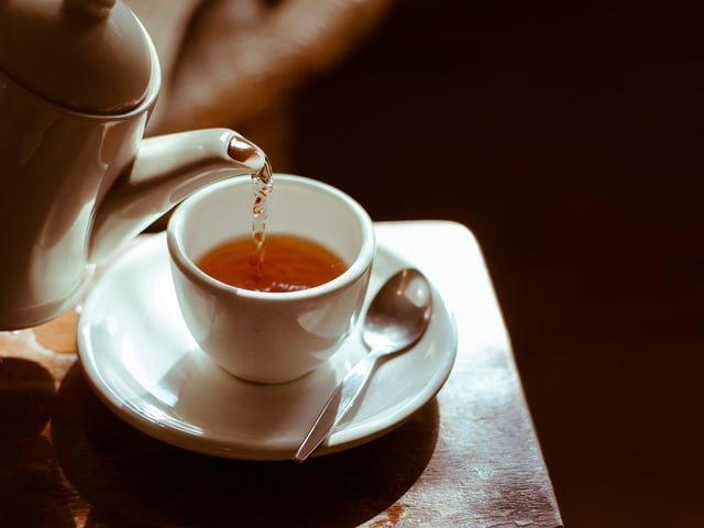 To put the kettle on and make a hot drink.