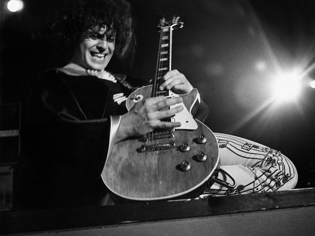 Marc Bolan on stage at Glasgow Apollo 1974