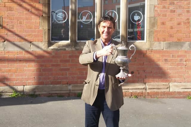 David Slater with the trophy, which he has donated to the Sheffield Home of Football campaign.