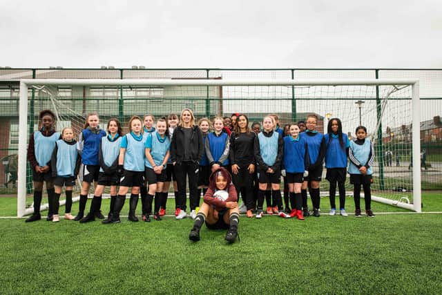 Firth Park Academy students pictured with Barclays Football Ambassadors Kelly Smith and Chelcee Grimes