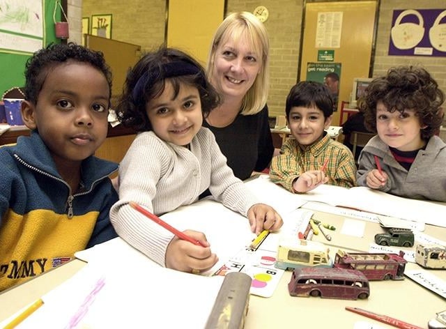 Pictured at Sharrow Infants School are, from left, Fuad Mohammed, Neelam Hafiz, deputy head Sue Atkinson, Hamaq Saleem and Patrick Baker on July 5, 2000