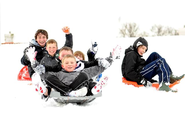 Kids from Sinclairtown Primary School and Viewforth High School enjoy the snow at Windmill Green in Kirkcaldy