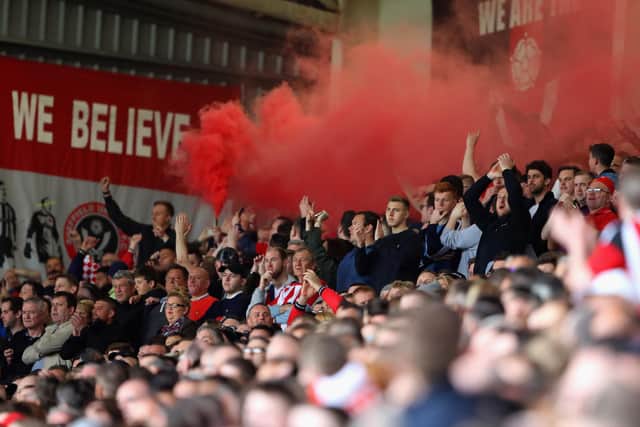 A flare is let off by a Sheffield United fan during a Sky Bet League One match against Chesterfield at Bramall Lane in April 2017. A fan has told how she was hit in the face by a smoke grenade during Sheffield United's match against Reading FC at the Madejski Stadium on Tuesday, November 23 this year (pic: Warren Little/Getty Images)