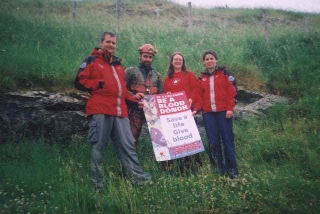 In 2001 Ian Bunting from Edale Mountain Rescue, with Mark Loftus from Derbyshire Cave Rescue, Eve Worthington from the National Blood Service and Izzy Murray from Edale Mountain Rescue helping to promote the Saving Lives Together campaign.
