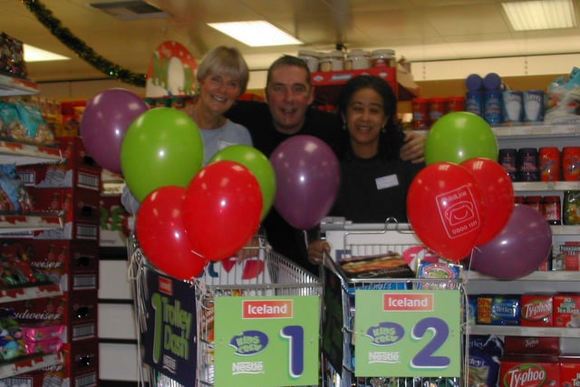 Hady Primary School in Chesterfield and local New Whittington Primary School, were given the chance to raid the aisles in Iceland's Whittington Moor store
 in 2002, in support of ChildLine. l-r: Mrs Morgan-Jones (Hady), Paul Cage (Dale Winton Lookalike) and Miss Billington (New Whttington).