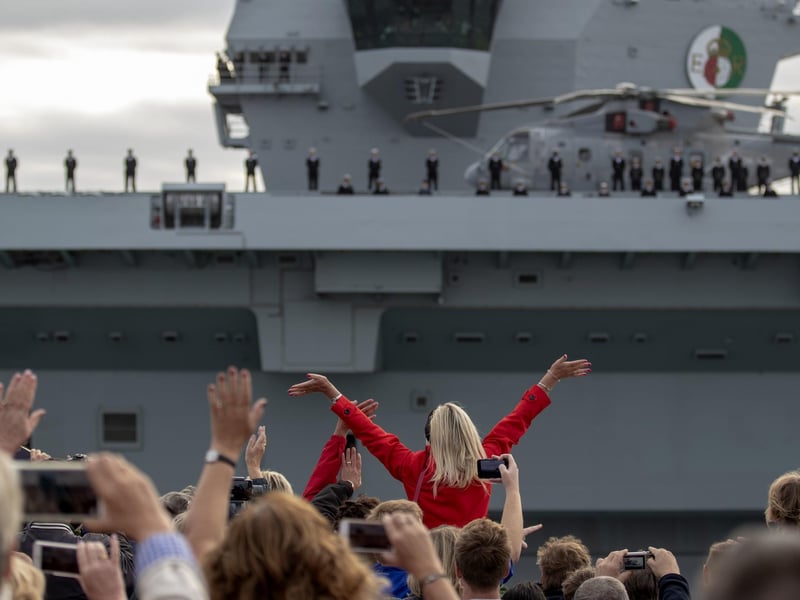Huge crowds gathered to wave HMS Queen Elizabeth off as she left Portsmouth Harbour for deployment in America. Picture: Steve Parsons/PA Wire