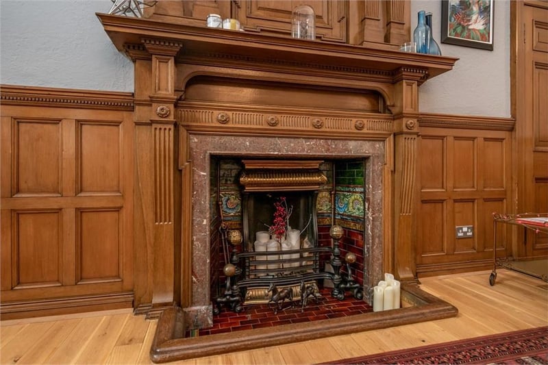 Original fireplace in sitting room.