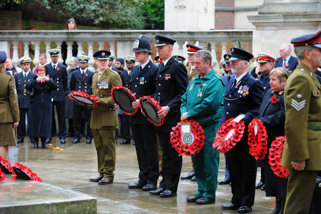 Remembrance Sunday service 2009 at Guildhall Square Portsmouth. Wreaths are prepared to be laid on behalf of civilian services.
Picture: Malcolm Wells (094900-6554)