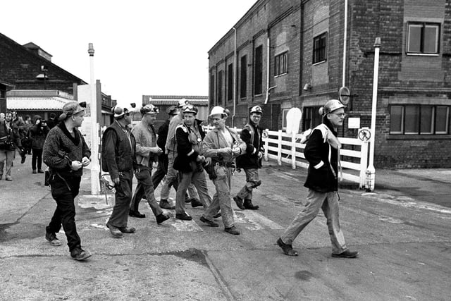 Miners return to work in 1994 as the mine was reopened.