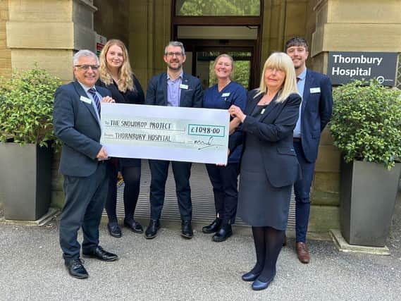 Kosta Antoniou and the team from Thornbury Hospital with the first cheque for Snowdrop Project 