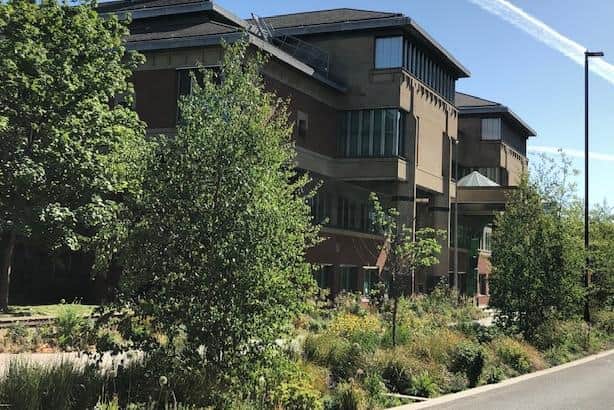Sheffield Crown Court, pictured, heard how a thug stabbed his ex-partner in the arm with a knife.
