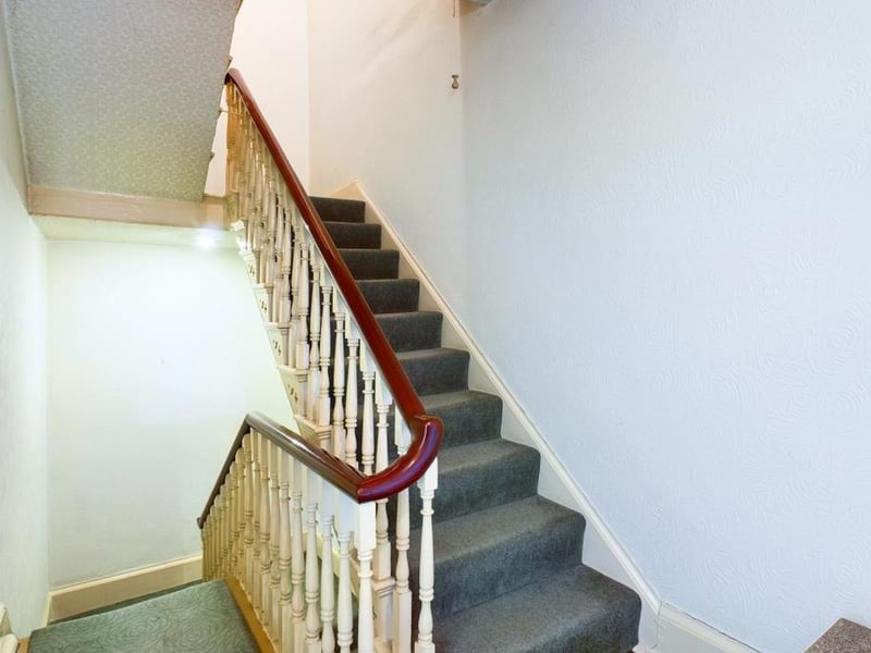Second Floor Stairs/Landing - Spindled balustrade rail, sliding door to landing area and power point.