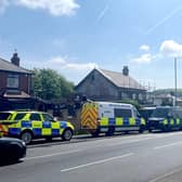 Emergency services on Brierley Road in Grimethorpe, Barnsley, where more than 100 homes were evacuated after an Army bomb squad was deployed on Wednesday, May 8. Two people have now been charged with drugs and firearms offences. Photo: Dave Higgens/PA Wire
