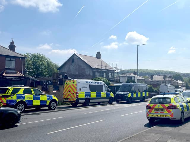 Emergency services on Brierley Road in Grimethorpe, Barnsley, where more than 100 homes were evacuated after an Army bomb squad was deployed on Wednesday, May 8. Two people have now been charged with drugs and firearms offences. Photo: Dave Higgens/PA Wire