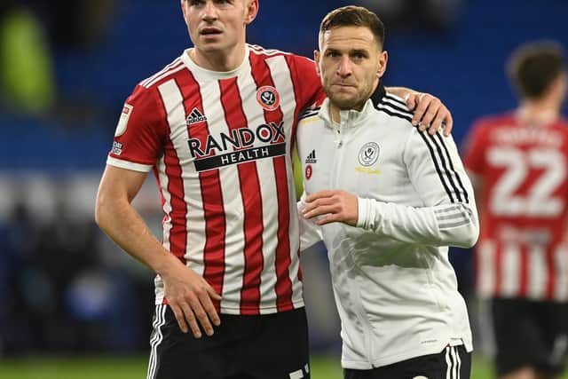 John Egan and Billy Sharp are both veterans of Sheffield United's last promotion to the Premier League: Ashley Crowden / Sportimage