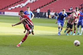 Sheffield United's Will Osula scores one of his four goals during a development game againsr Colchester United: Andrew Yates / Sportimage