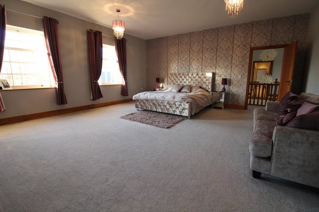 This stunning room is one of five bedrooms in the property