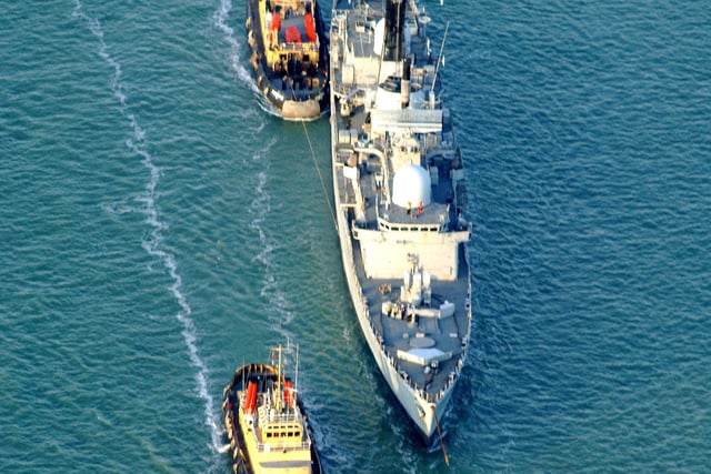 The former HMS Cardiff leaving Portsmouth Harbour for the last time on the 18th November 2008. Picture: Roger Smith