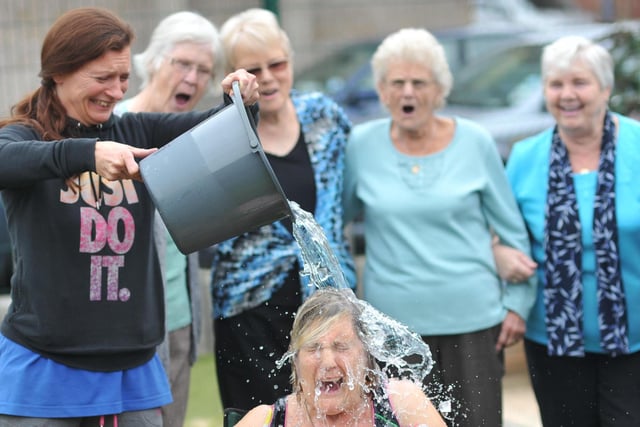 Mavis gets a soaking at the Lynnfield Centre. Are you in the picture with her in this 2014 scene?