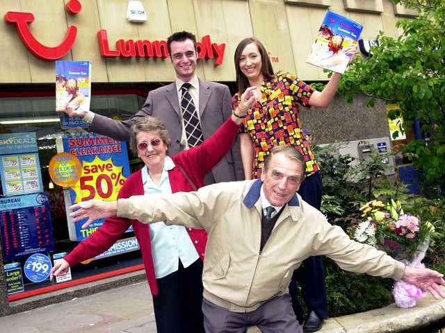 May 4 2005 - George Barnard and Audrey Boardman, of Adwick, celebrate booking the first holiday from Robin Hood Airport. Looking on were the airport's business development manager, Gareth Kennedy, and Lunn Poly sales consultant, Natalie Skelton.