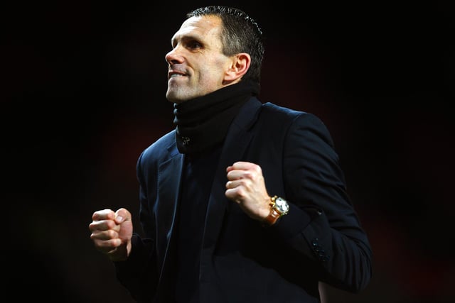 Gus Poyet celebrates after his team won 2-1 in the penalty shootout during the Capital One Cup semi-final second leg match between Manchester United and Sunderland at Old Trafford on January 22, 2014.