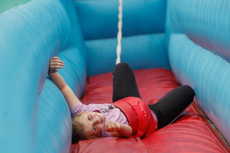 Eight-year-old Haley Duncan tried out the horizontal bungee. Picture: Scott Louden.