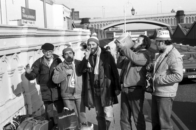 French fans arrive in Edinburgh ahead of the Scotland v France Five Nations rugby match at Murrayfield in March 1984. After beating Wales to win the Triple Crown, Scotland completed the Grand Slam by beating France 21-12.