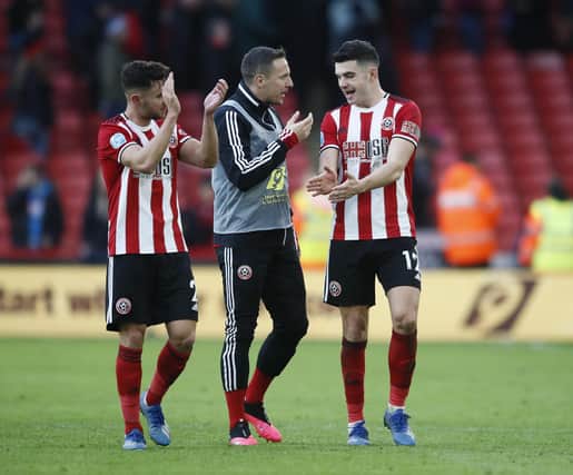Phil Jagielka (C) with George Baldock and John Egan of Sheffield United, who is suspended for tonight's game against Manchester United at Old Trafford: Simon Bellis/Sportimage
