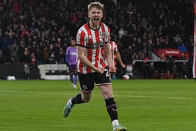 Tommy Doyle of Sheffield United celebrates scoring his first goal for the Blades since signing on loan from Manchester City: Gary Oakley / Sportimage