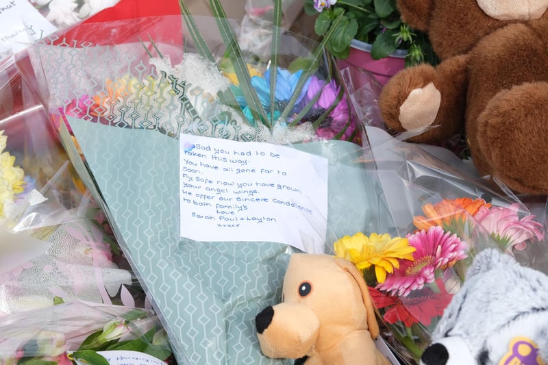 Floral tributes at the scene of a multiple murder in Killamarsh. Picture: Dean Atkins.