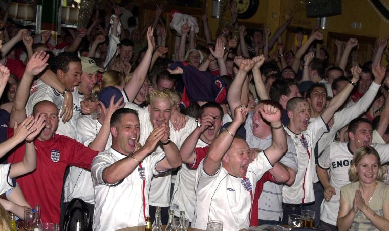 Fans cheering for England at the Walkabout pub in 2002.
