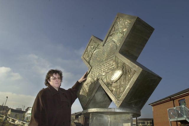 Poet Carol Ann Duffy and the sculpture inscribed with  her poem at the beginning of the Five Weirs Walk, The Wicker