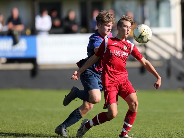 Horndean (red) v US Portsmouth in the Under-18s Hampshire Combination East Division. Picture: Chris Moorhouse