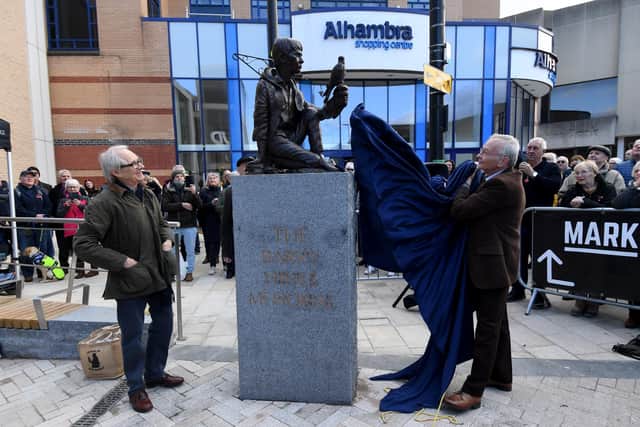 Unveiling of the Barry Hines Memorial of Kes, Cheapside Barnsley.. The Film director of the Film Kes, Ken Loach (left) and David Bradley who played Billy Casper in the film unveil the statue created by Graham Ibbeson