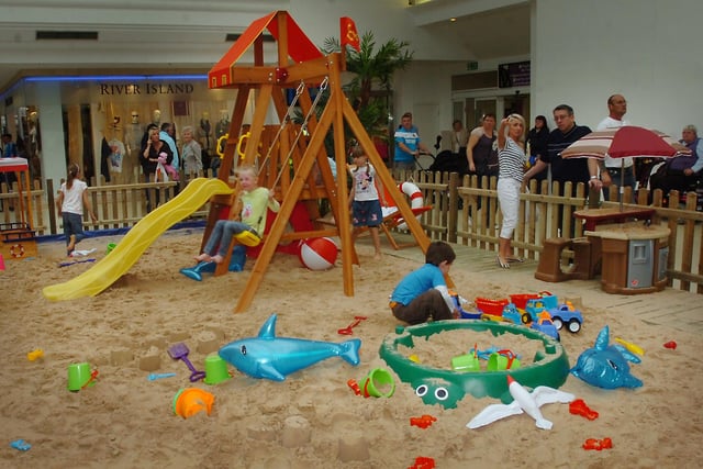 The indoor beach at the Bridges in 2011. Can you spot someone you know?