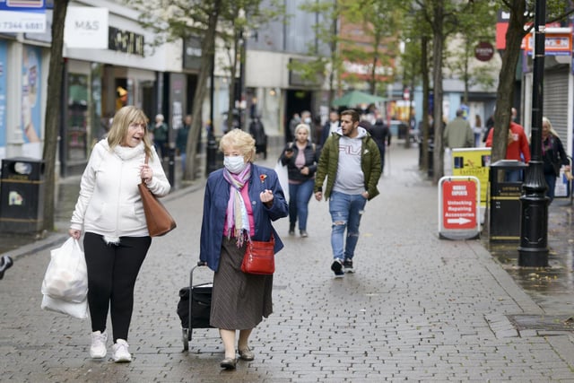 Shoppers on the  streets of Doncaster Town centre as South Yorkshire enters the Tier-3 restrictions imposed by the government to try to halt the spread of Covid-19