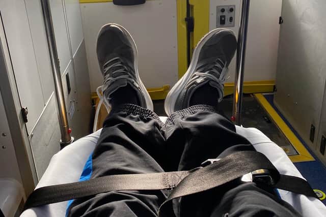 Chris Cuthbert inside an ambulance.