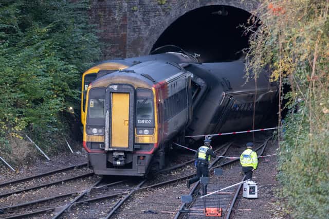 The South Western Railway train from London to Devon is seen on an angle after colliding with a stopped GWR service