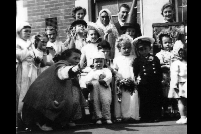The fancy dress parade at the 1953 coronation street party in Methuen Road, Southsea